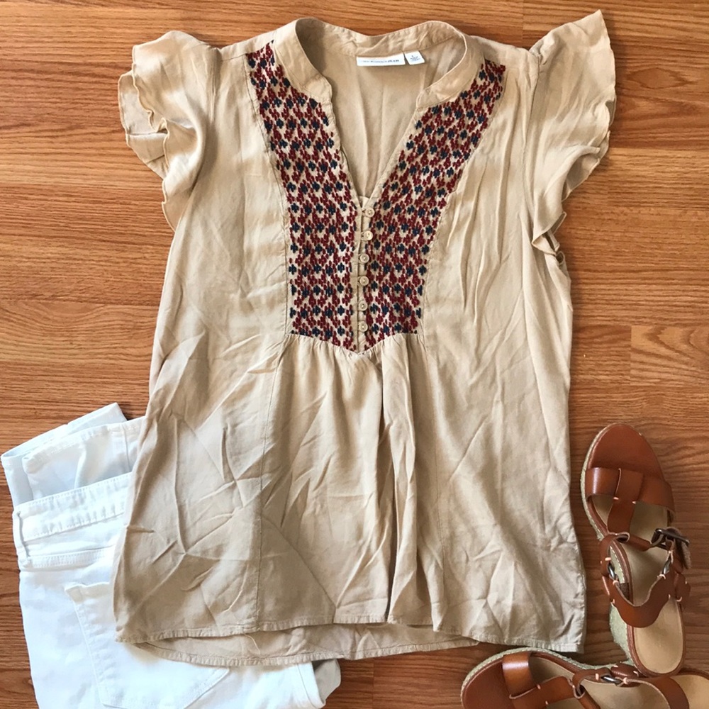 Beige blouse with ruffle sleeves